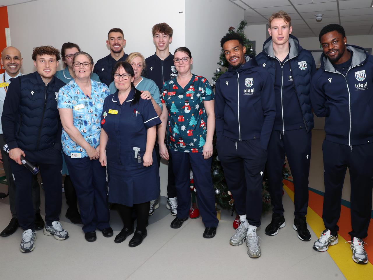 Albion players pose for a photo with NHS staff members at Midlands Metropolitan University Hospital 