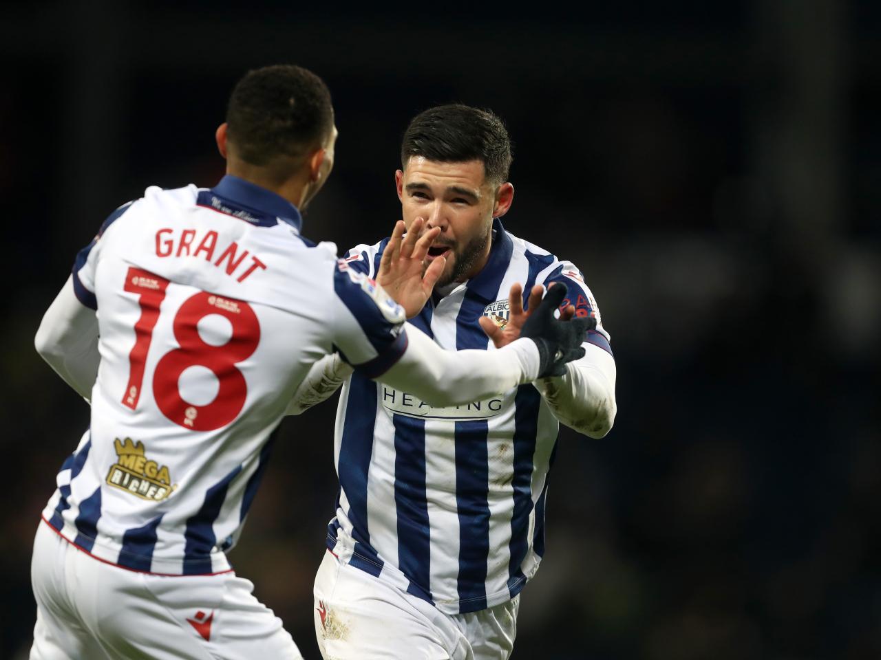 Alex Mowatt celebrates scoring against Coventry City with Karlan Grant 