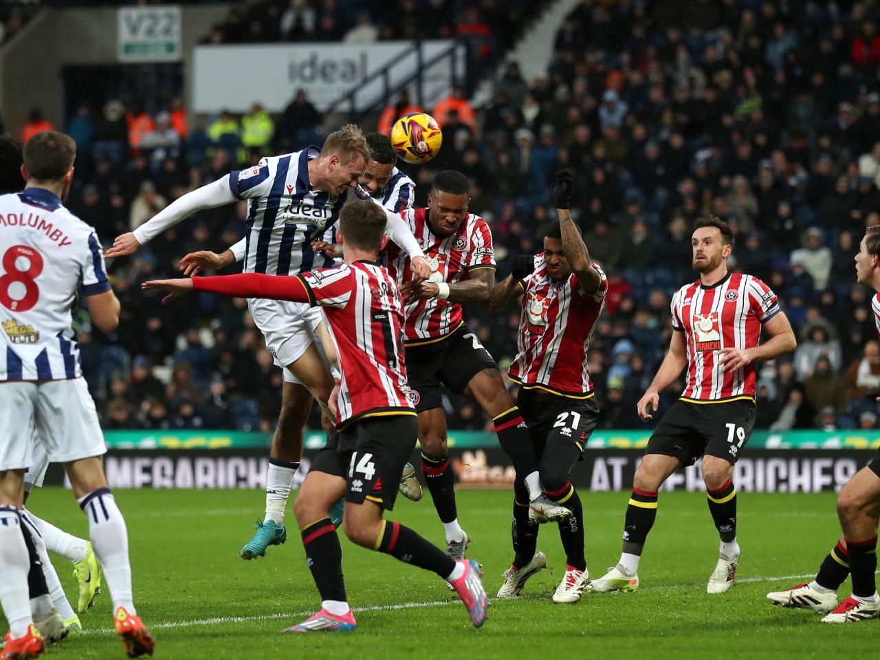 Torbjørn Heggem scores a header against Sheffield United 