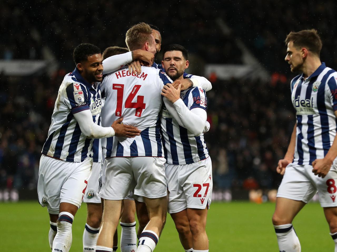 Torbjørn Heggem celebrates scoring a header against Sheffield United with team-mates 