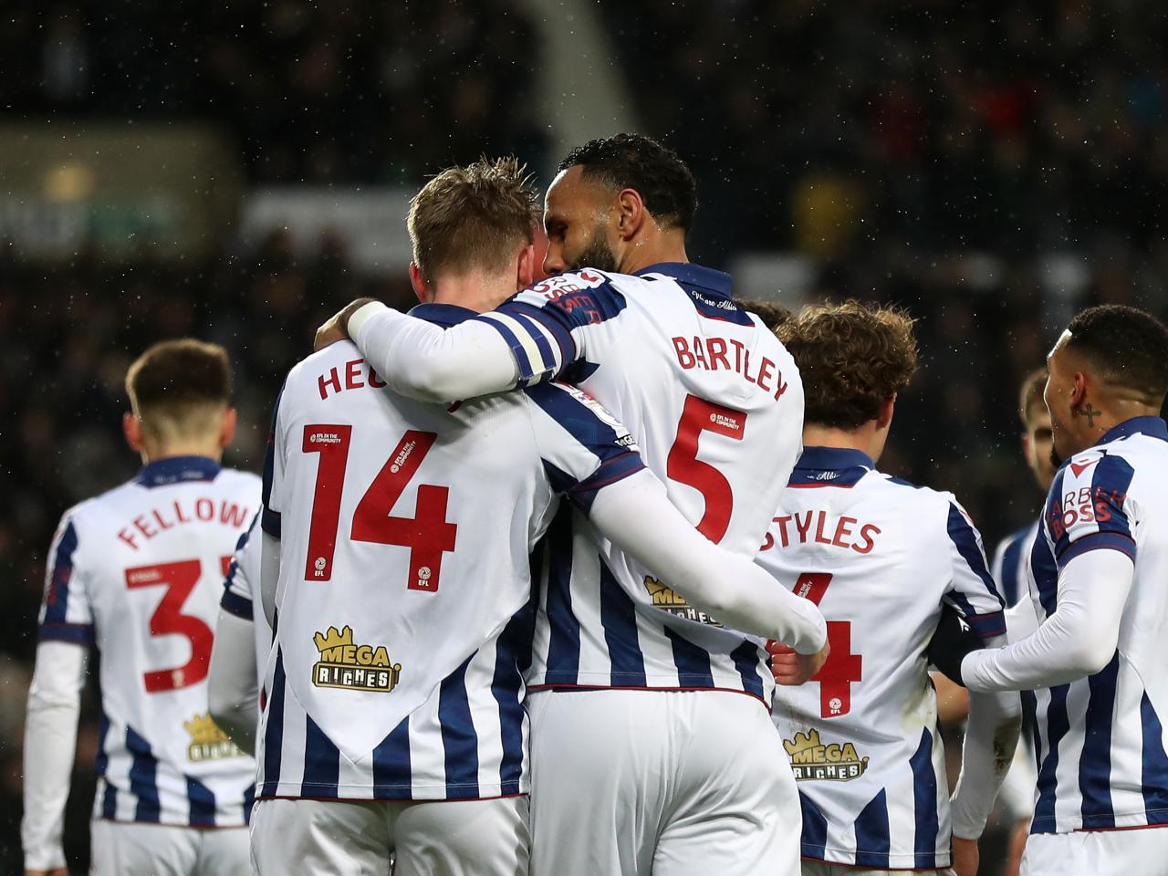 Torbjørn Heggem celebrates scoring a header against Sheffield United with team-mates