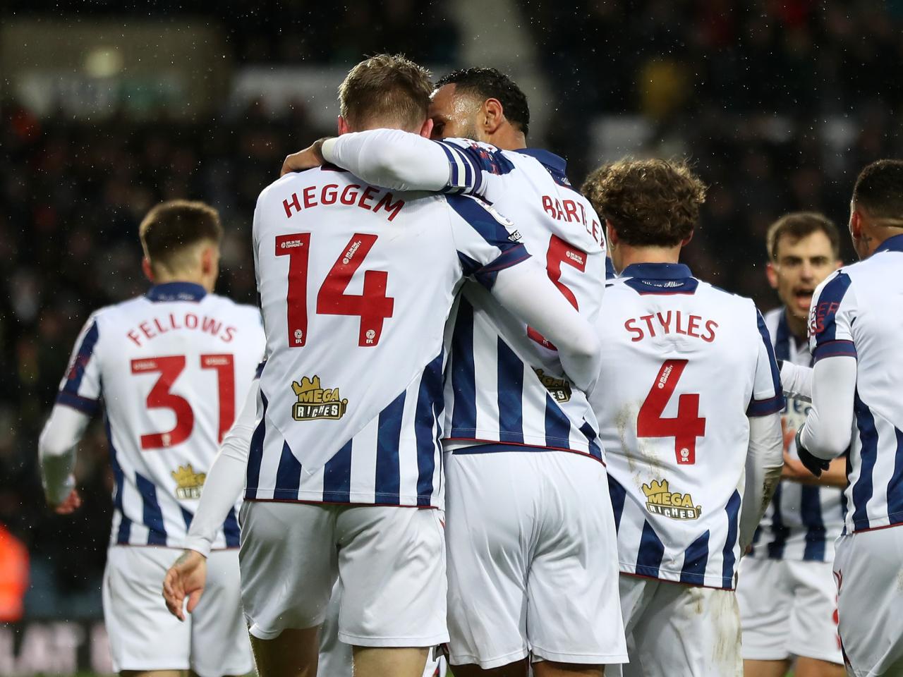 Torbjørn Heggem celebrates scoring a header against Sheffield United with team-mates