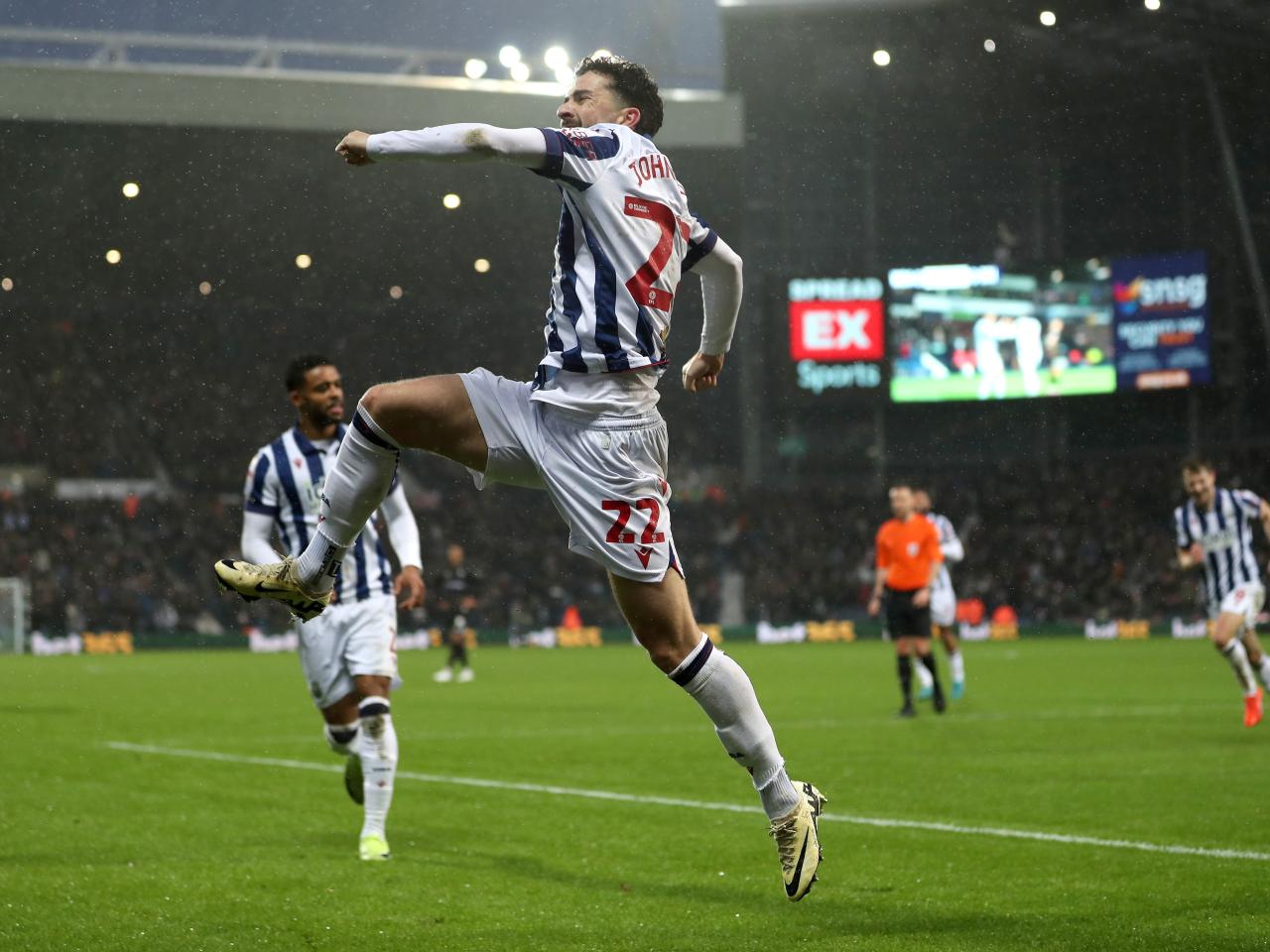 Mikey Johnston celebrates scoring a header against Bristol City 
