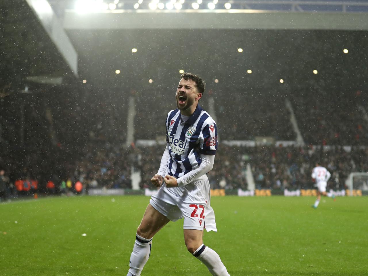 Mikey Johnston celebrates scoring a header against Bristol City 