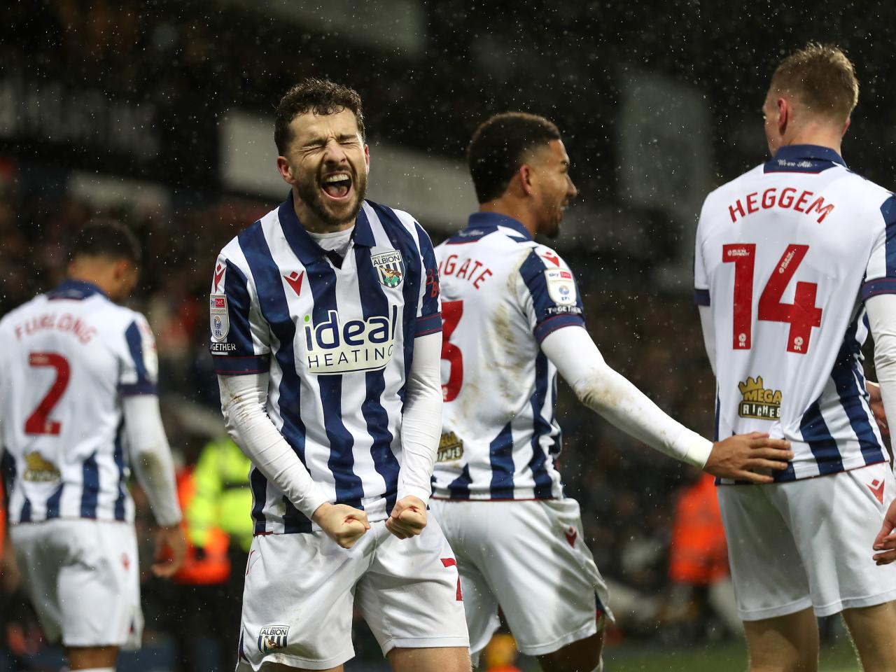 Mikey Johnston celebrates scoring a header against Bristol City 