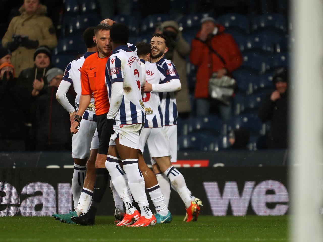 Mikey Johnston celebrates his second goal against Bristol City with team-mates 