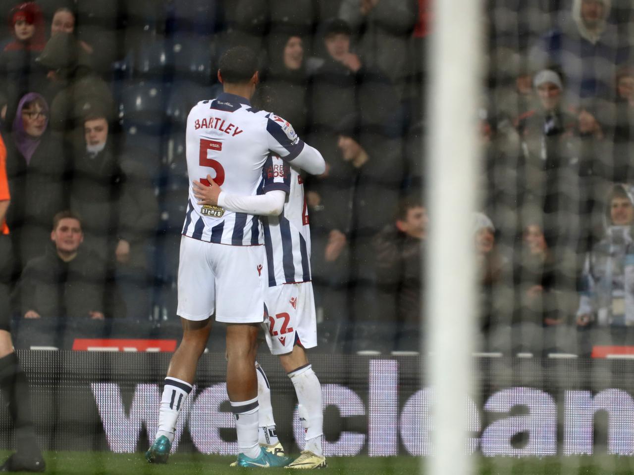 Mikey Johnston celebrates his second goal against Bristol City with Kyle Bartley