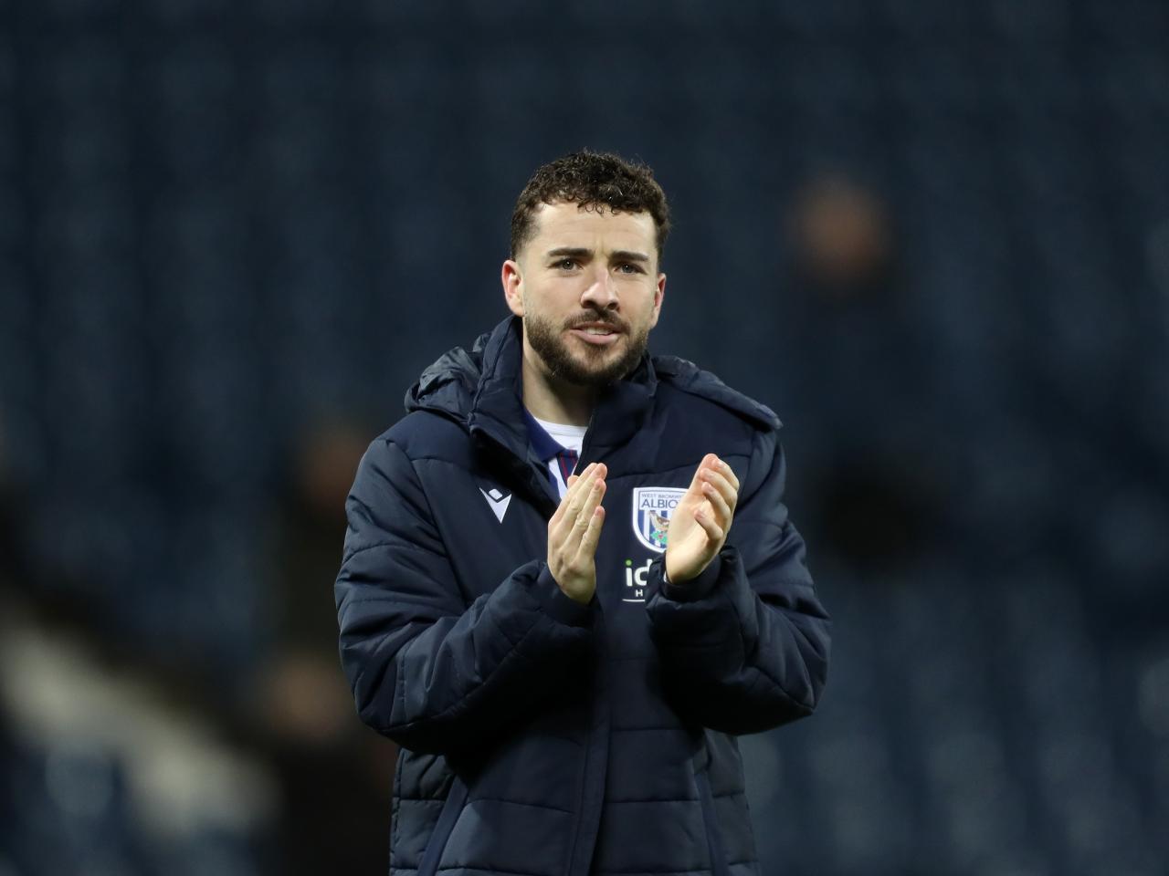 Mikey Johnston applauds Albion fans following the win over Bristol City