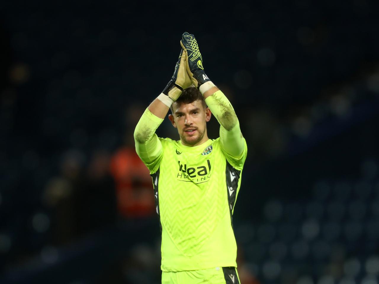 Alex Palmer applauds supporters after Albion's win against Coventry City 