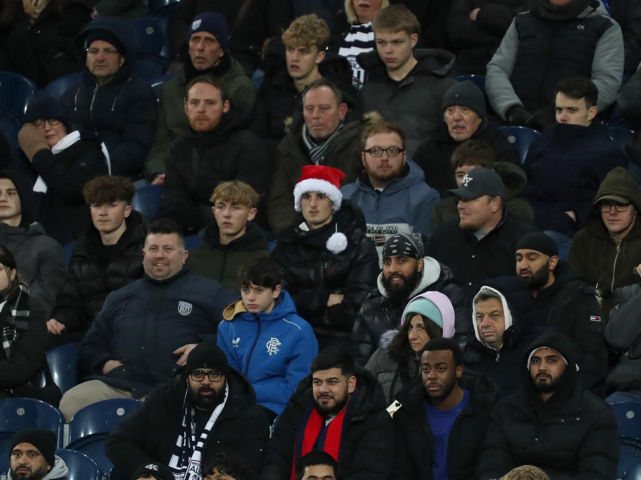 A general view of Albion fans watching the Coventry City game from the stand 