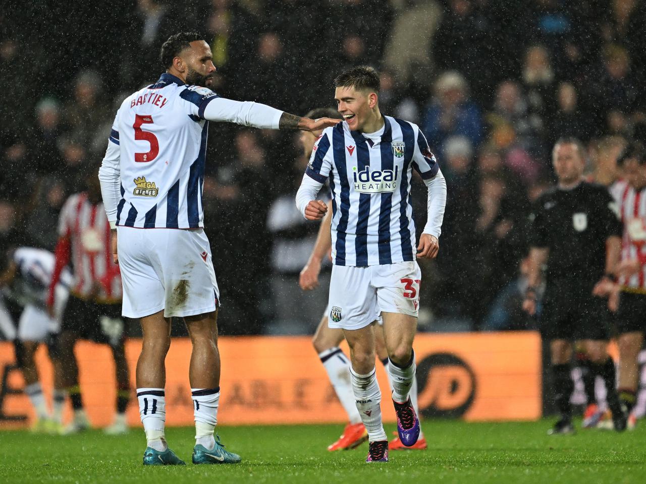 Tom Fellows celebrates scoring against Sheffield United with Kyle Bartley