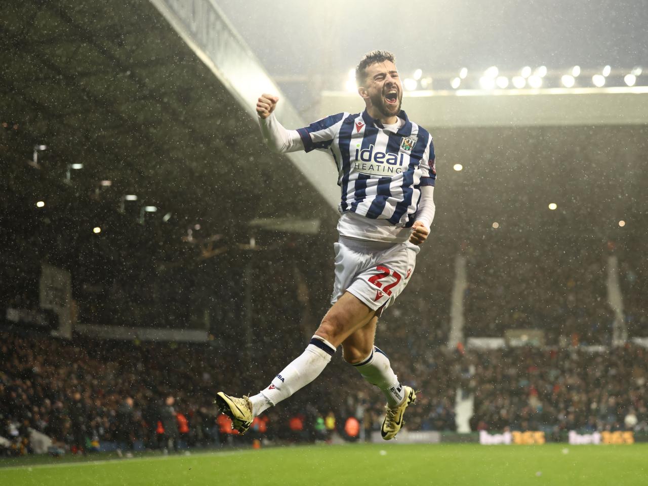 Mikey Johnston celebrates scoring a header against Bristol City 