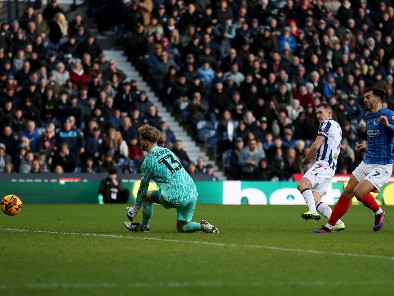 Jed Wallace shoots and scores against Portsmouth at The Hawthorns
