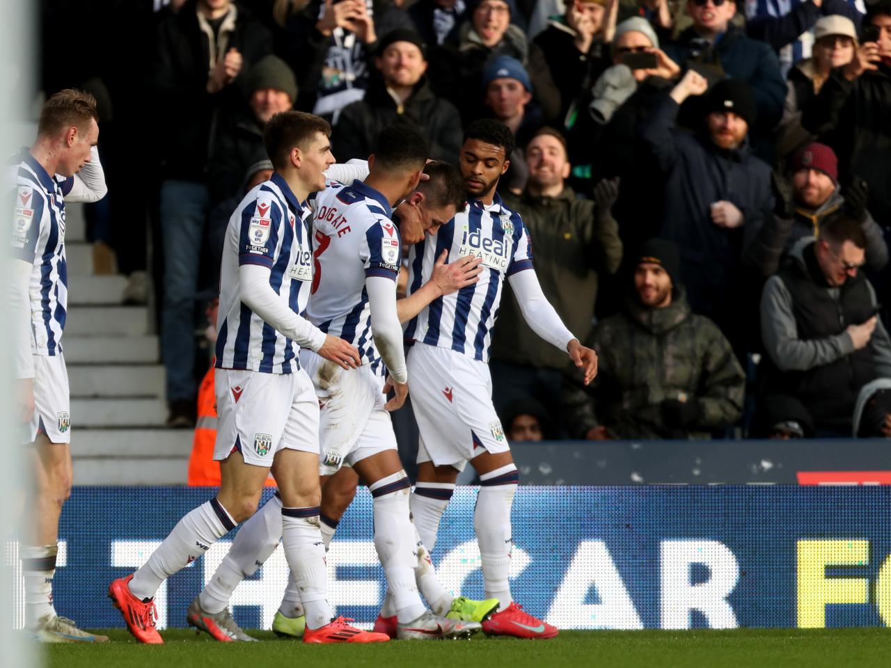 Jed Wallace celebrates scoring against Portsmouth at The Hawthorns with team-mates