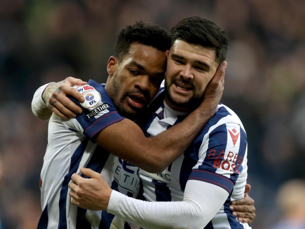 Grady Diangana celebrates scoring against Portsmouth with Alex Mowatt