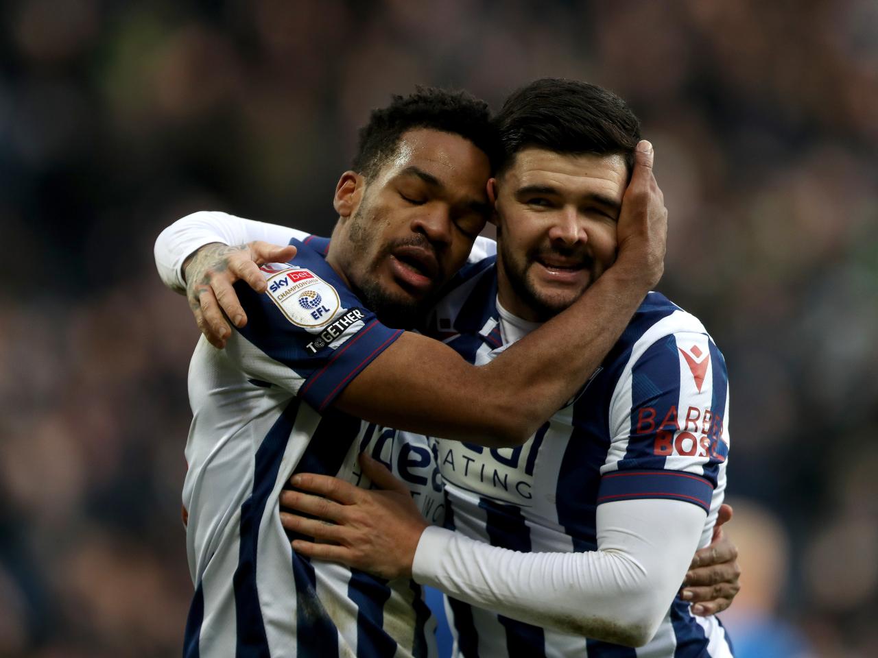 Grady Diangana celebrates scoring against Portsmouth with Alex Mowatt