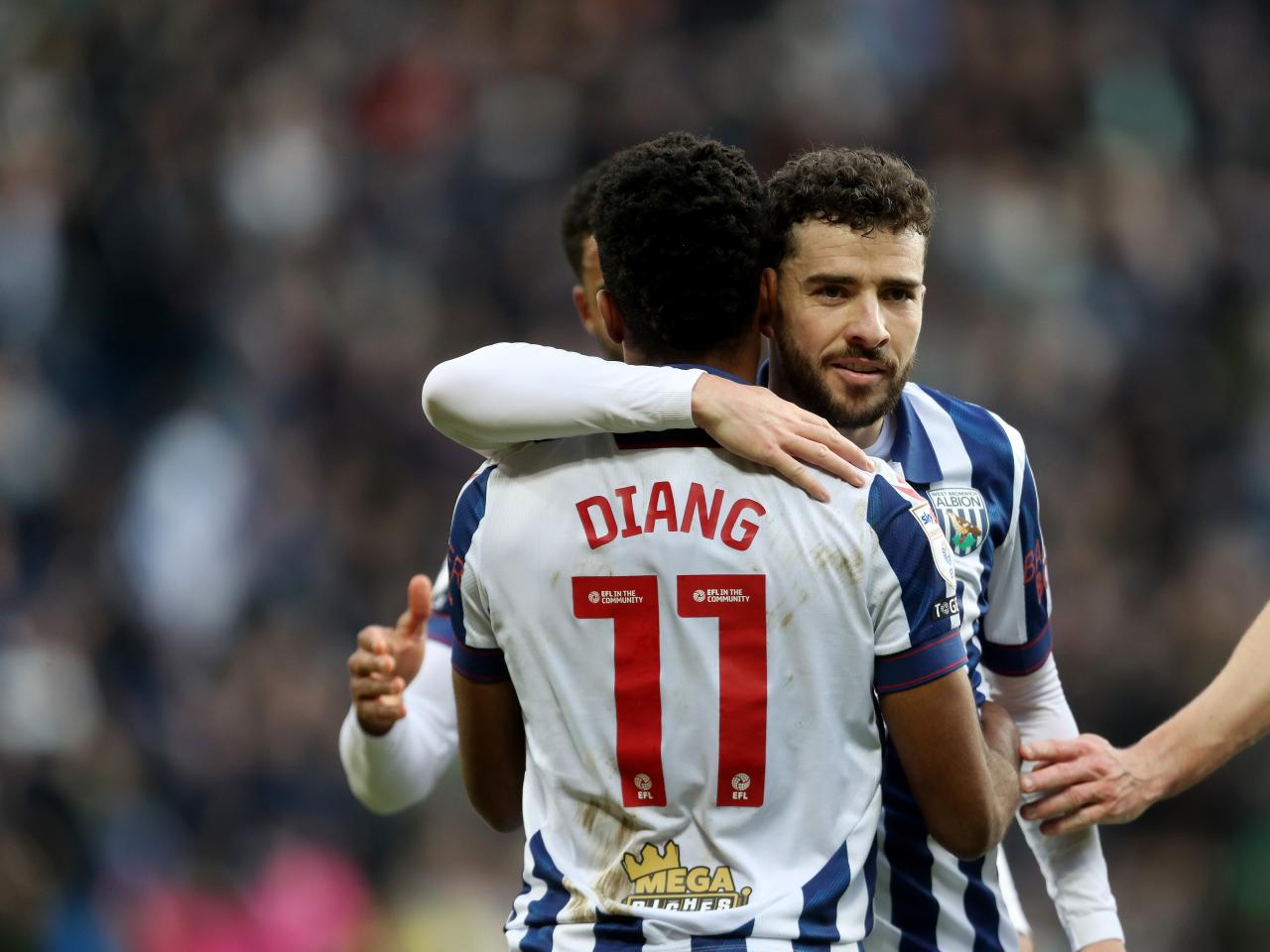 Grady Diangana celebrates scoring against Portsmouth with Mikey Johnston