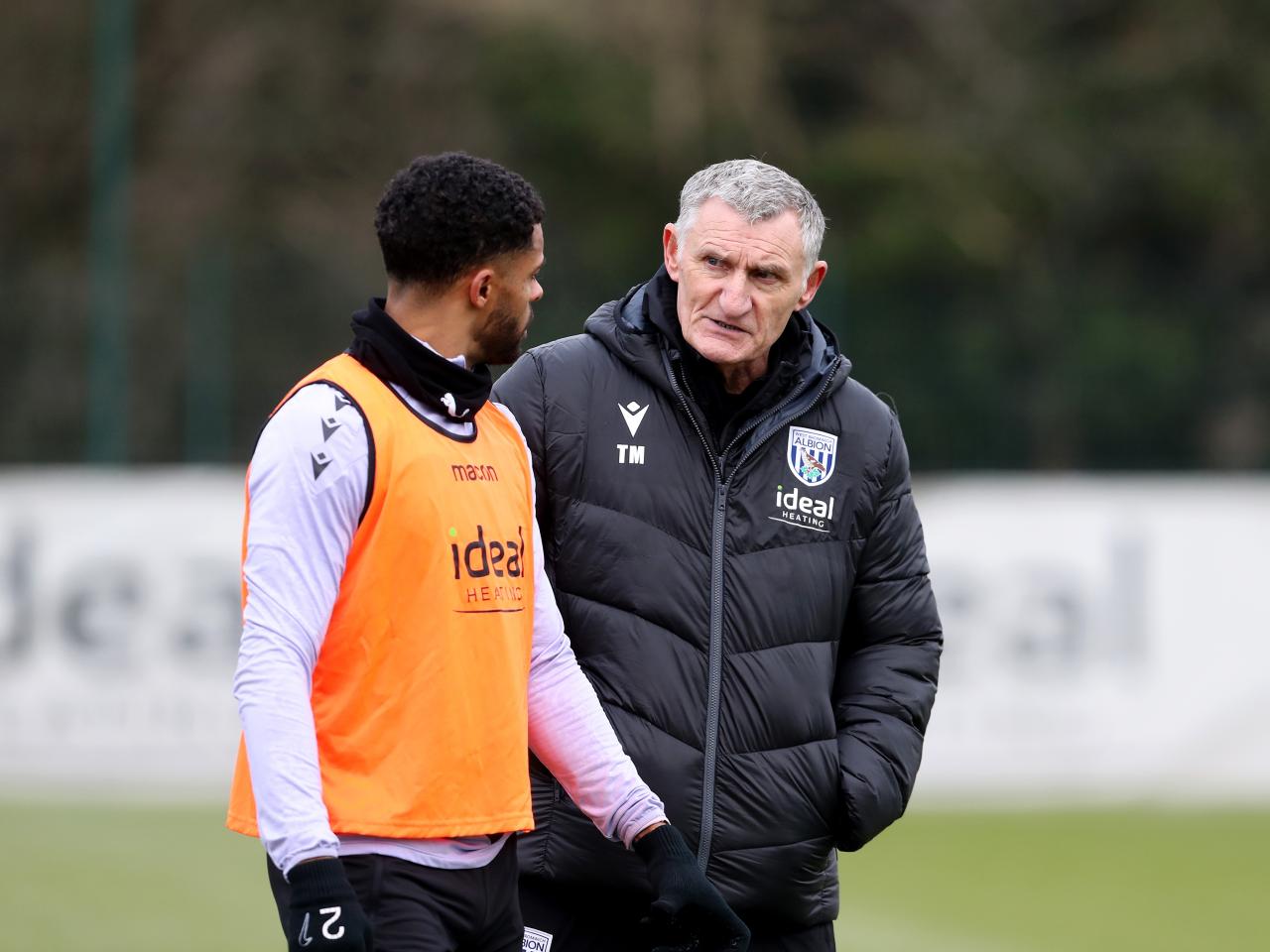 Tony Mowbray chatting to Darnell Furlong