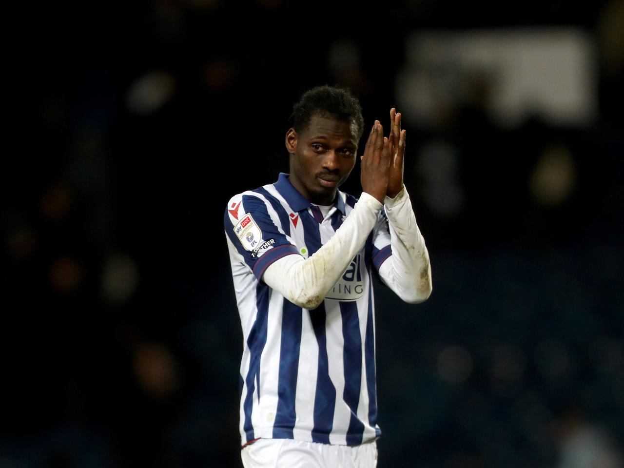 Ousmane Diakité applauding Albion fans after the win over Preston