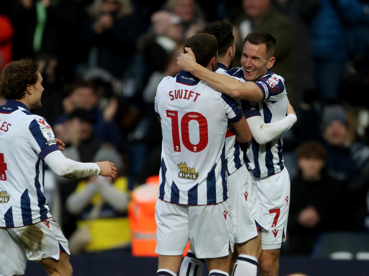 John Swift celebrates scoring against Portsmouth with Jed Wallace
