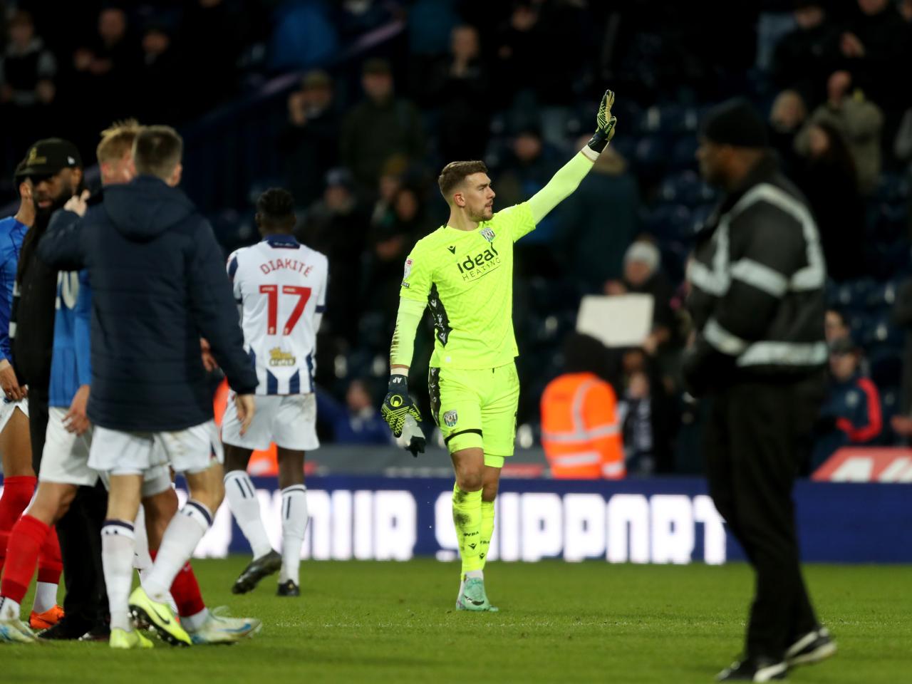 Alex Palmer applauding Albion fans after beating Portsmouth