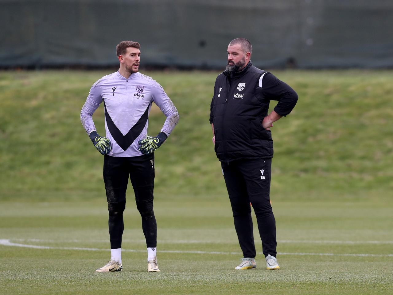 Alex Palmer chatting to Boaz Myhill during a training session