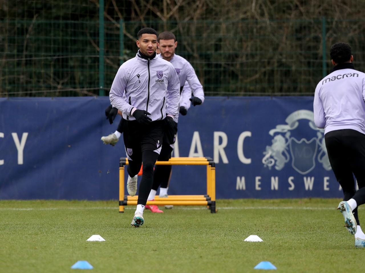 Mason Holgate warming up before a training session