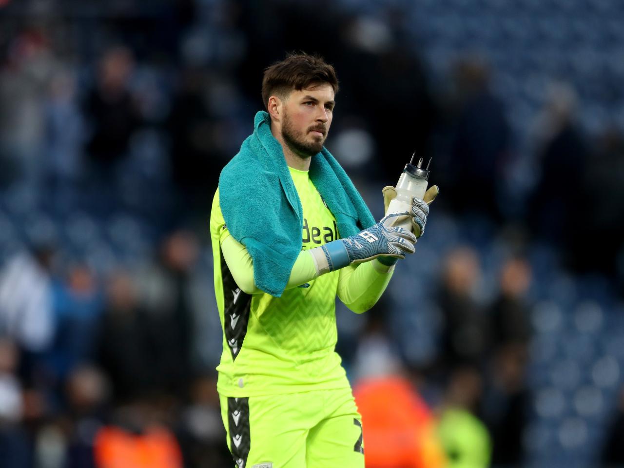 Joe Wildsmith applauding Albion fans after the Oxford game