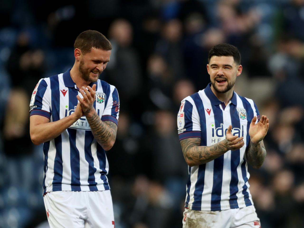 John Swift and Alex Mowatt applauding Albion fans after the Oxford game