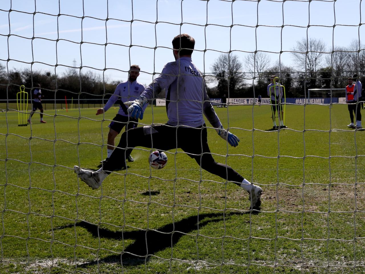 Adam Armstrong trying to score past Josh Griffiths in training 