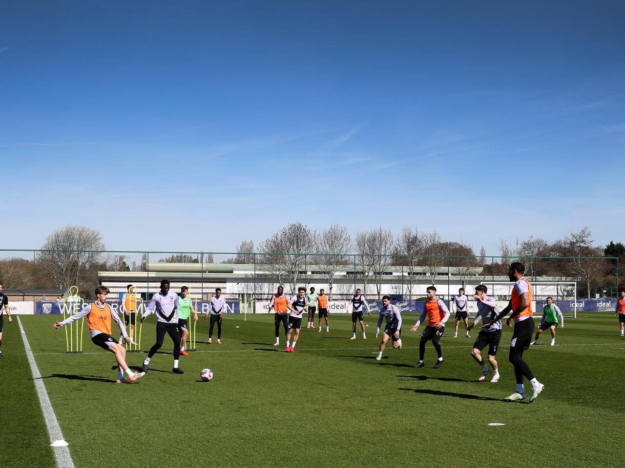 A general view of a training session with several players in shot