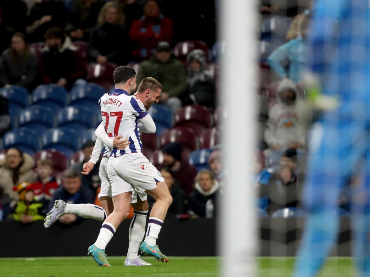John Swift celebrates scoring a free-kick at Burnley