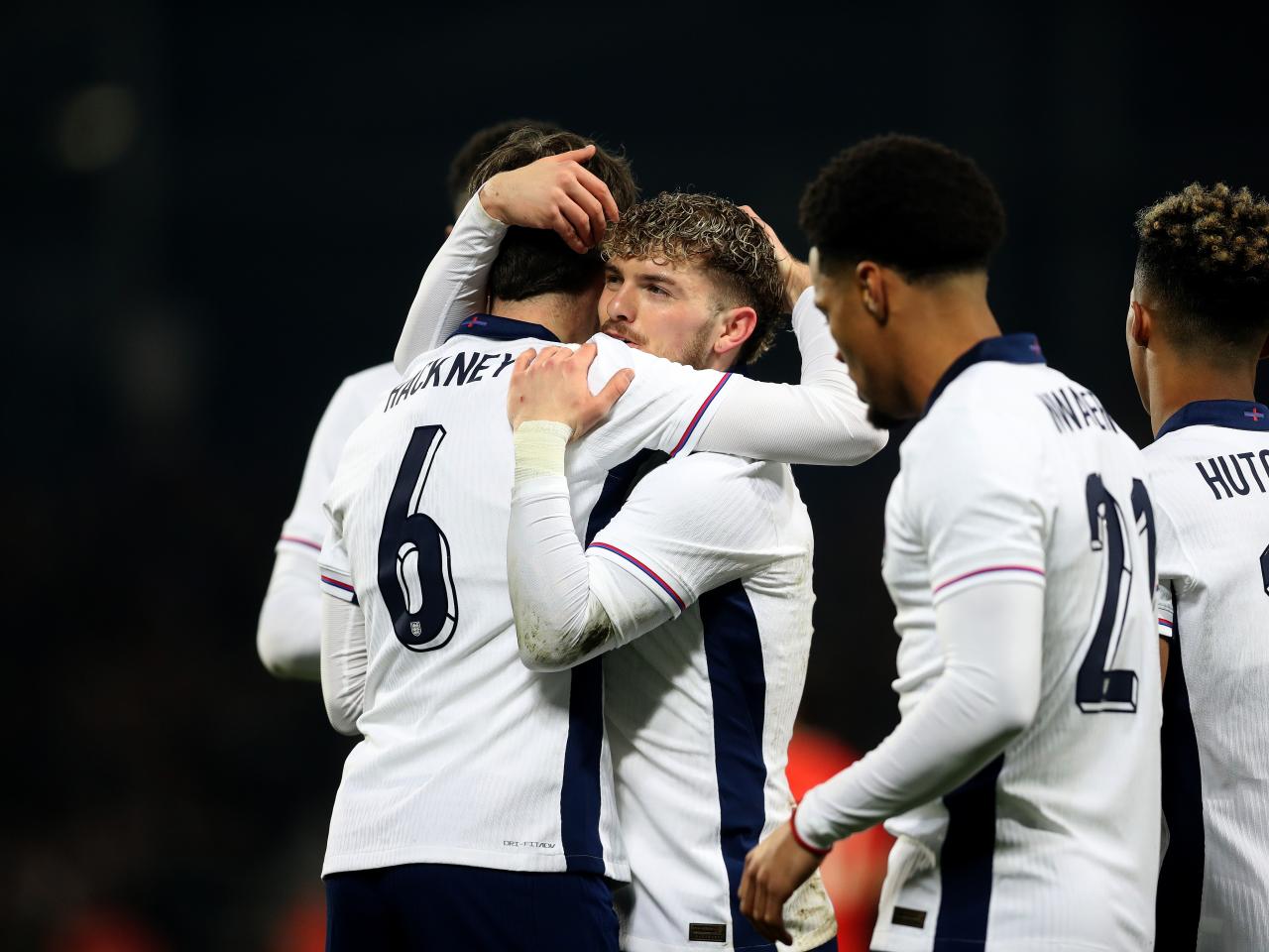 Several England players celebrate a goal scored against Portugal at The Hawthorns