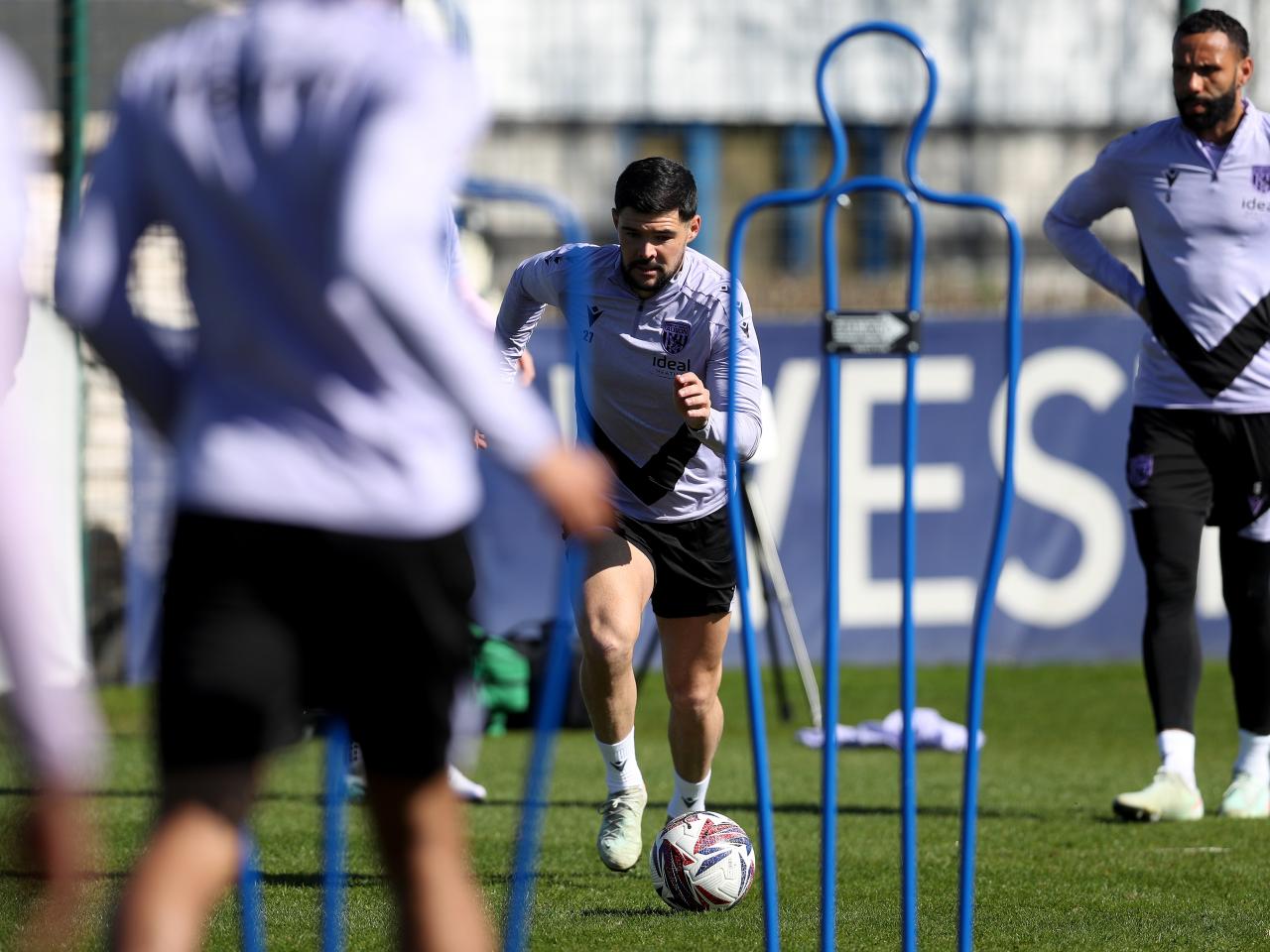 Alex Mowatt on the ball during training 