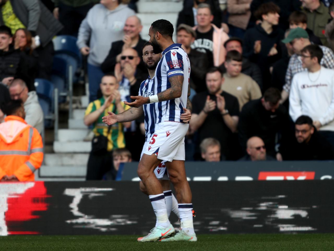 Adam Armstrong celebrates with Kyle Bartley after scoring against QPR 
