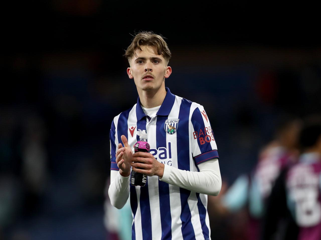 Isaac Price applauding Albion fans after the game at Burnley