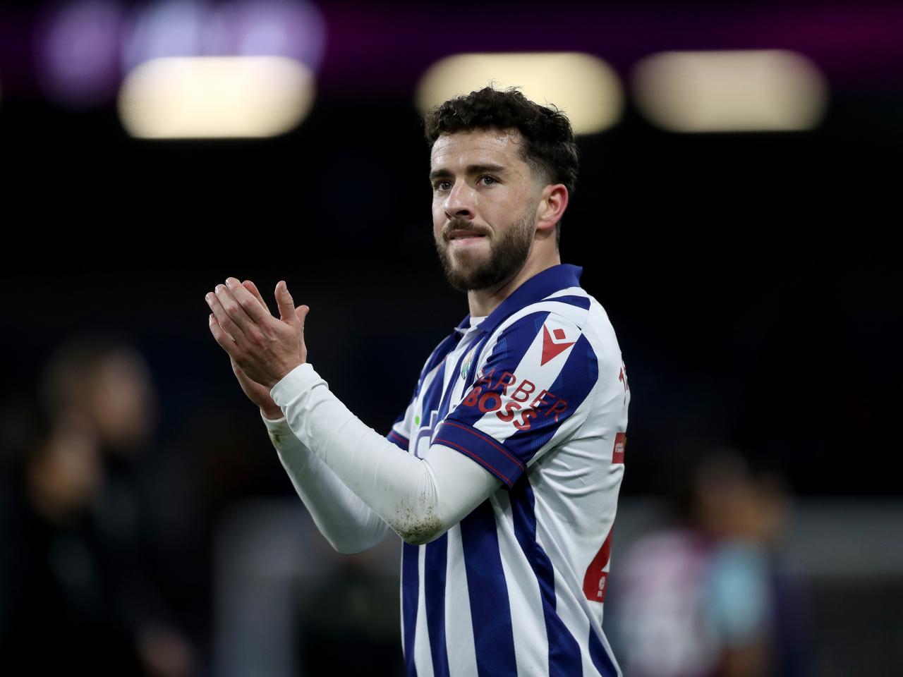 Mikey Johnston applauding Albion fans after the game at Burnley