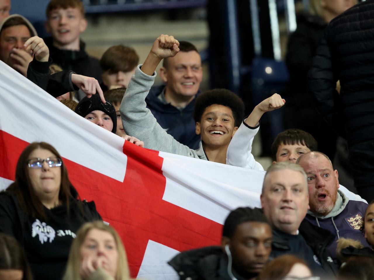 England fans in the stands at The Hawthorns with England flags