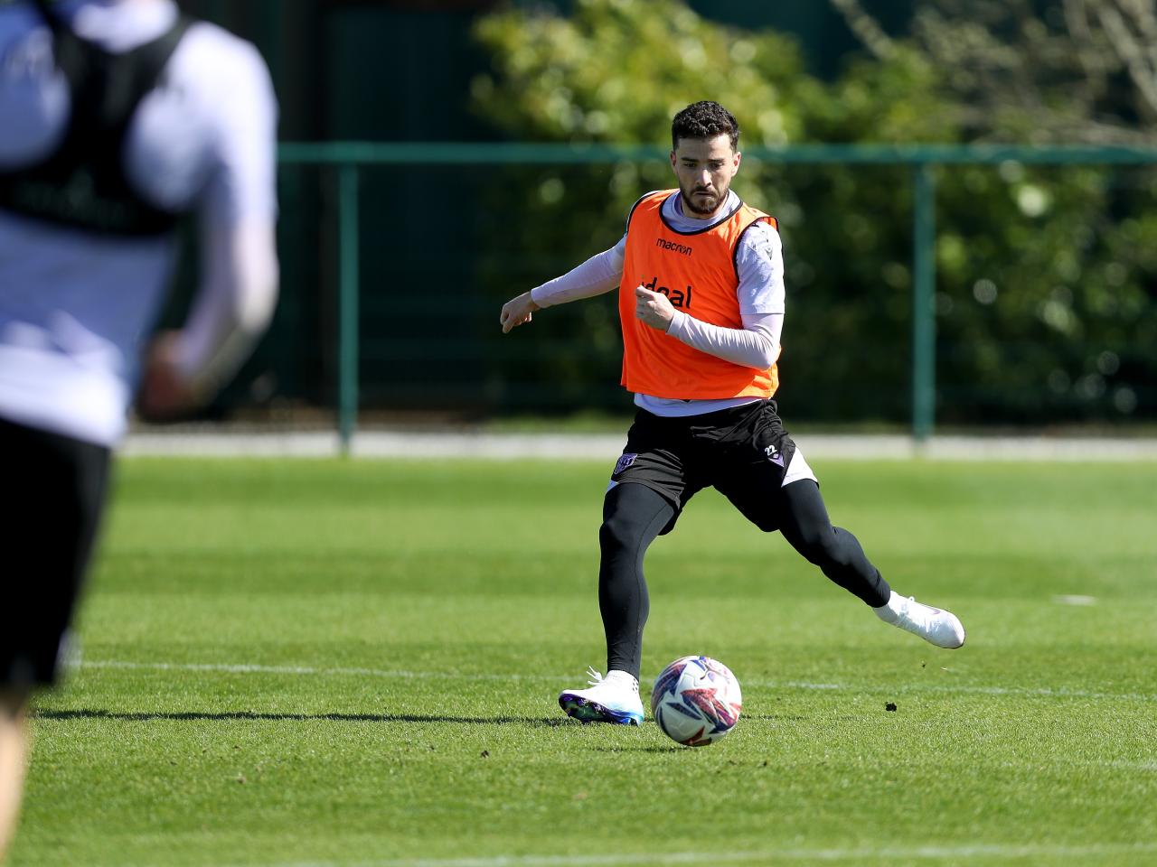 Mikey Johnston on the ball during training 