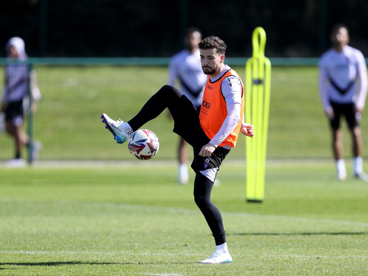 Mikey Johnston on the ball during training 