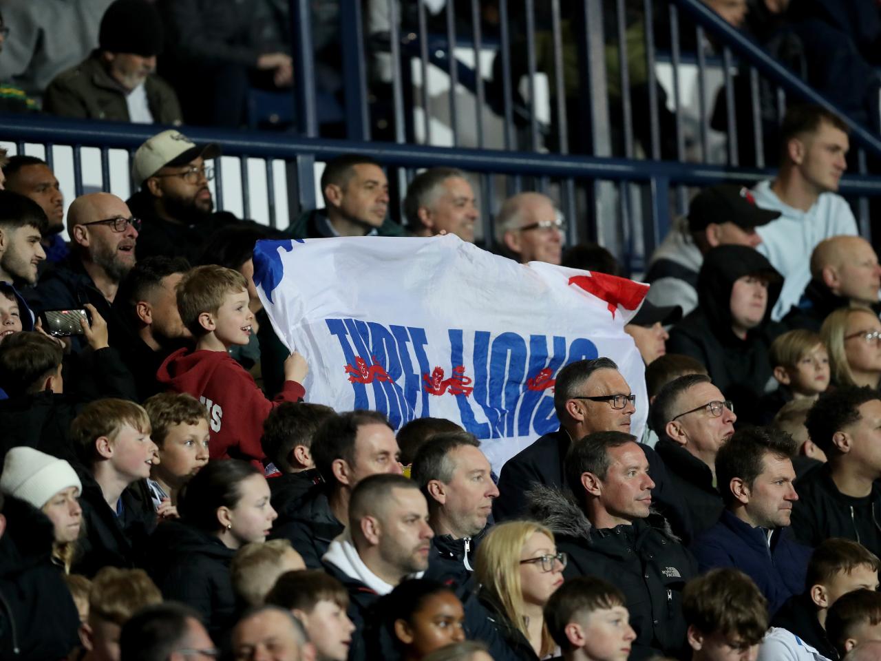 England fans in the stands at The Hawthorns with England flags