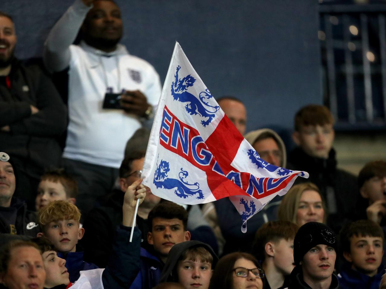 England fans in the stands at The Hawthorns with England flags
