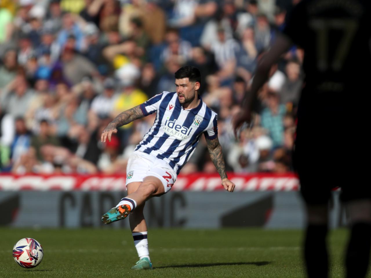 Alex Mowatt passing the ball against QPR 