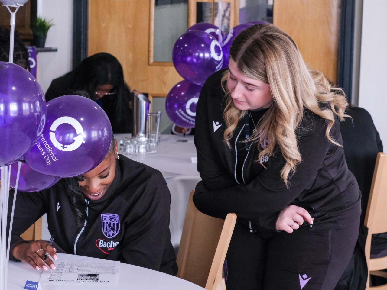Eve and Ocean work on a word search.