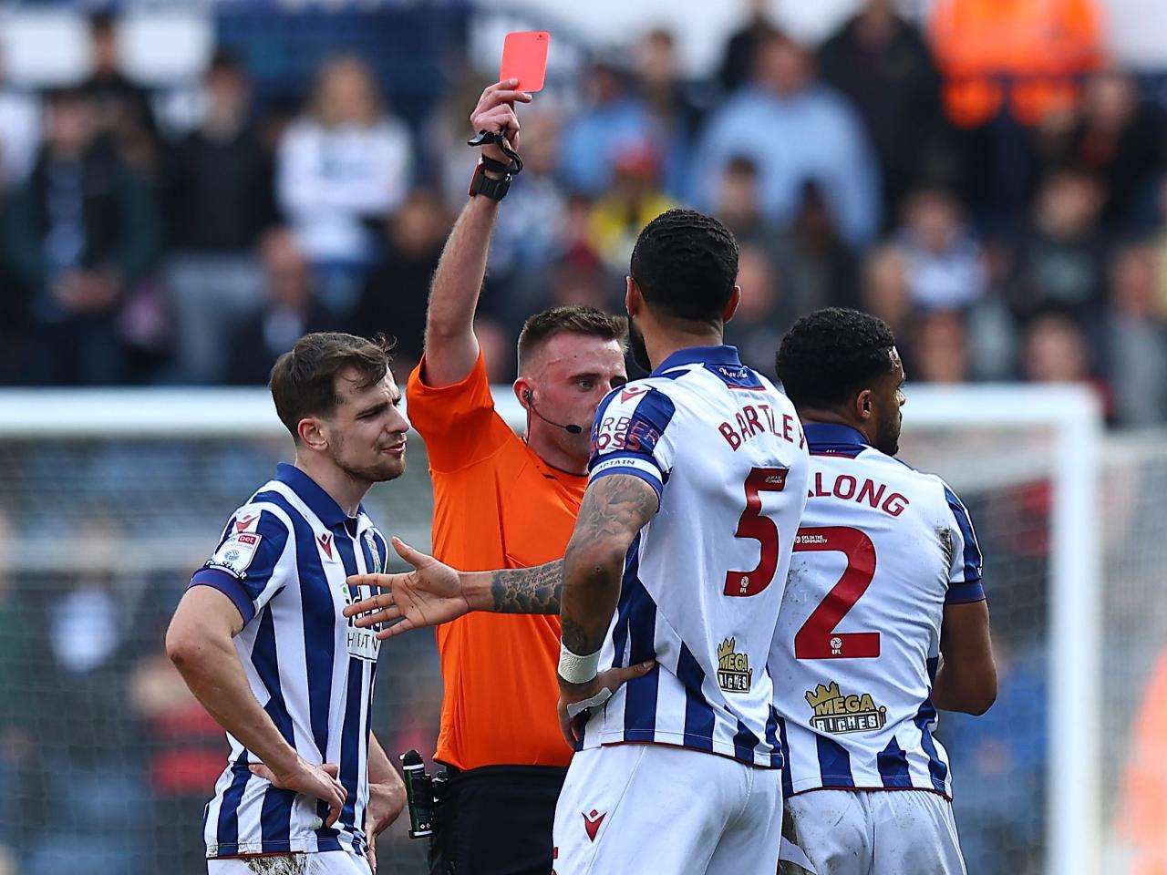 Darnell Furlong is shown a red card against QPR 