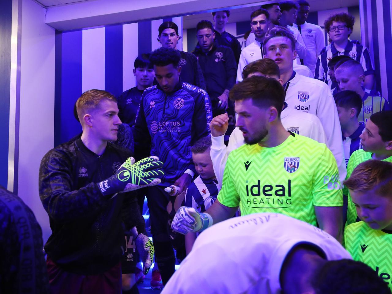 QPR and WBA line up in the tunnel ahead of the game at The Hawthorns