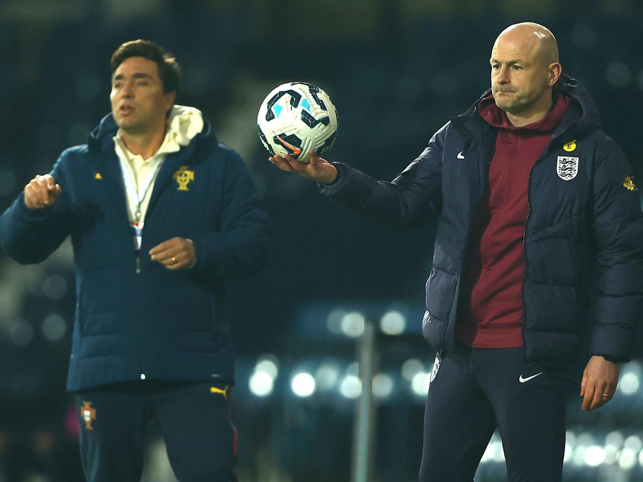 England U21 boss Lee Carsley on the side of the pitch at The Hawthorns holding a ball