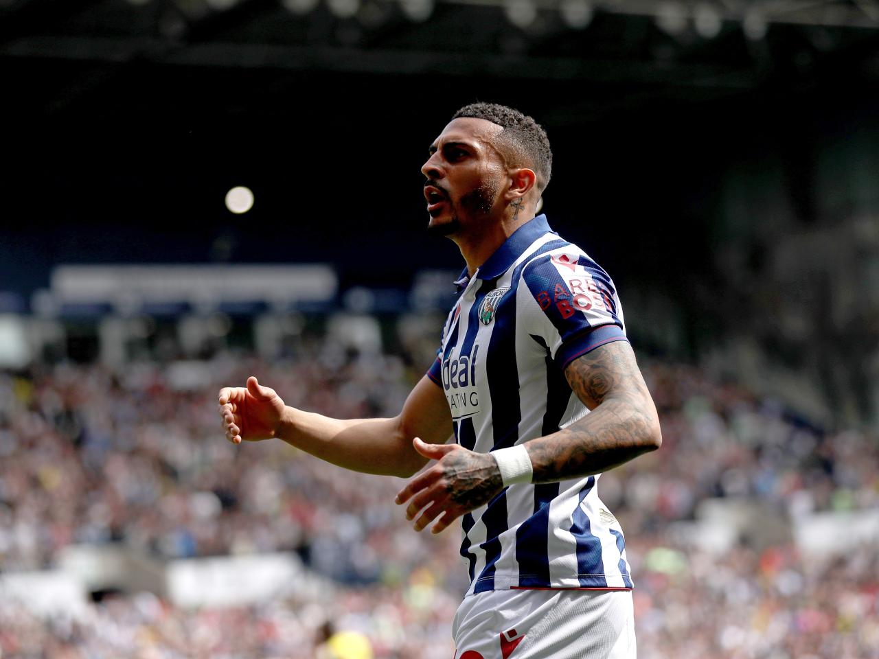 karlan Grant celebrates scoring against Watford 