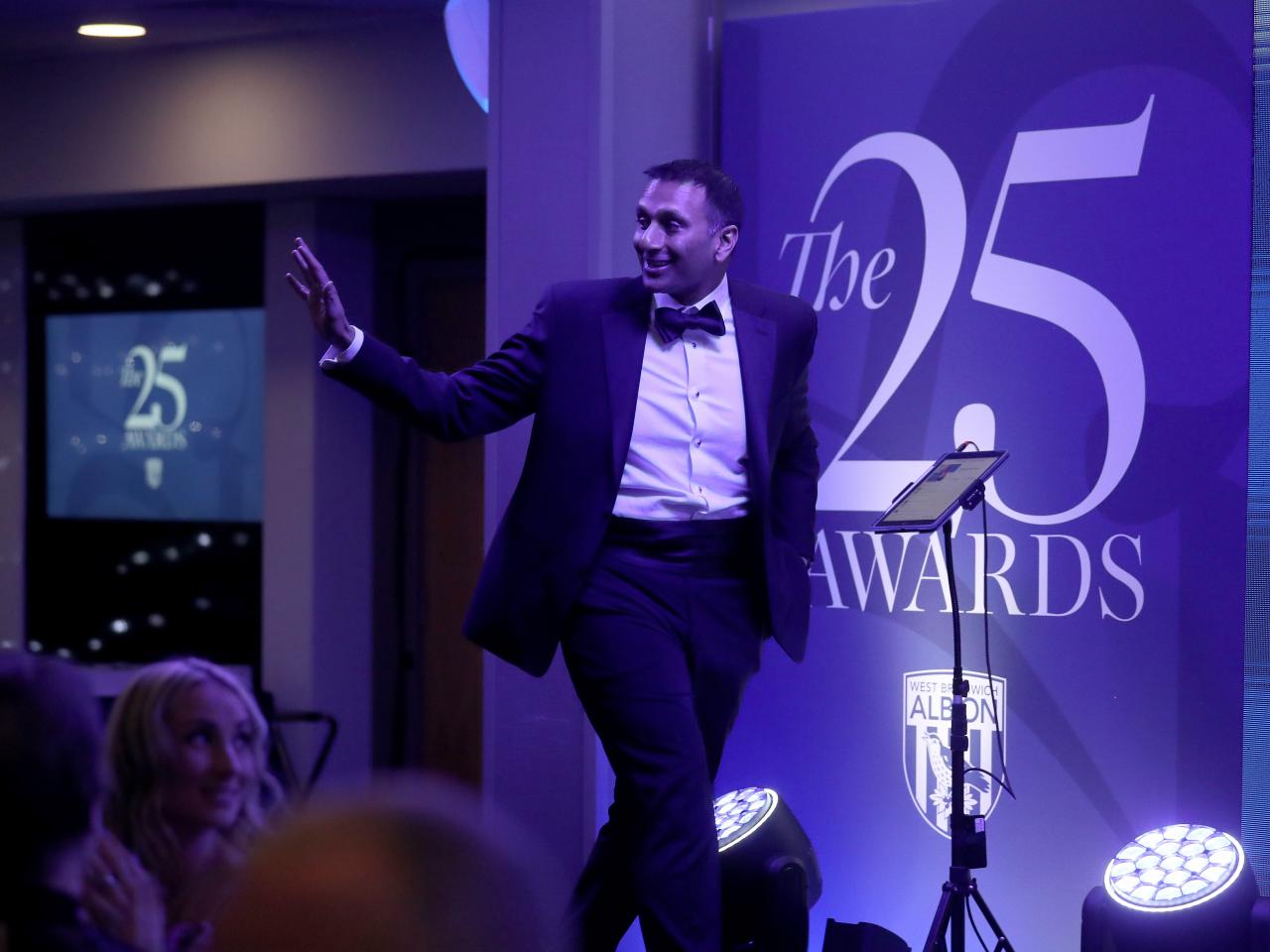 Shilen Patel on stage at the end of season awards dinner