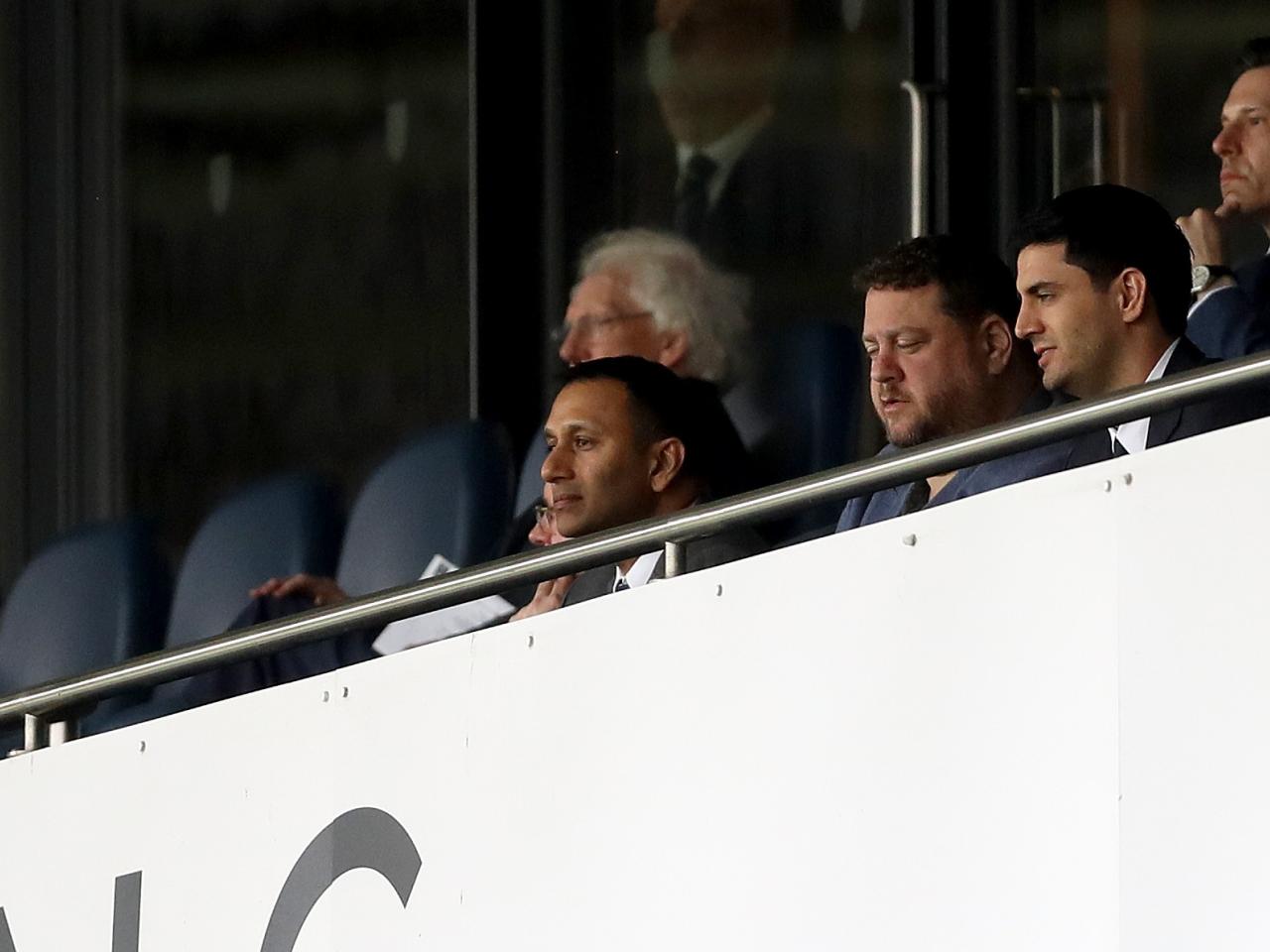 Shilen Patel watching Albion play Watford from a balcony